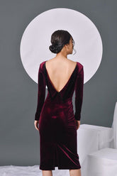 Fitted velvet midi dress with long sleeves and deep V-back for elegant evening styling